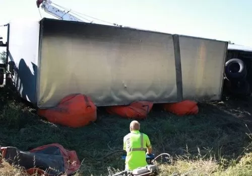 A semi truck trailer being lifted out of a ditch during Recovery in South Central Illinois