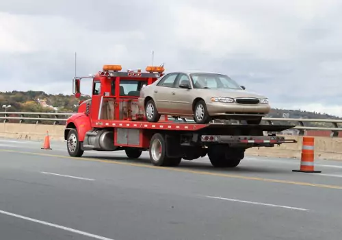 Local Tow Trucks for Effingham IL transporting a passenger car