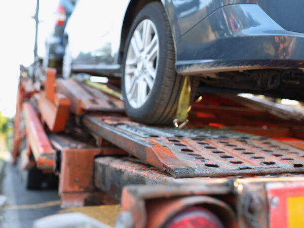 A car is on a truck after the driver called for towing Vandalia IL services