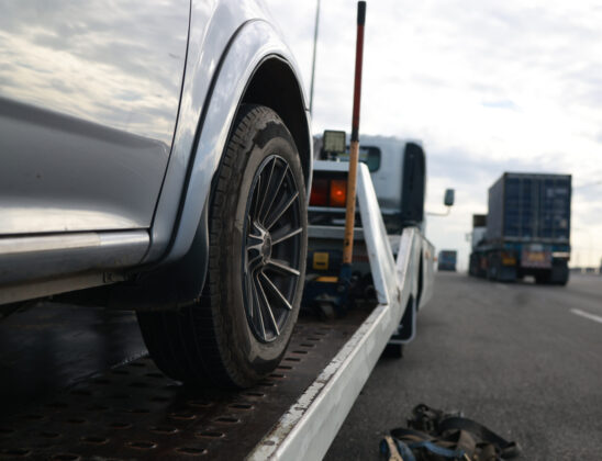 A broken-down vehicle on the highway in Mattoon IL receives expert care from a tow truck